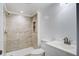 Modern tiled bathroom with vanity, new faucet, and walk-in shower provides a clean and inviting space at 117 Dairy Ln, Cottageville, SC 29435