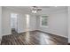 Spacious bedroom with a window for natural light and walk-in closet adjacent to the private bathroom at 117 Dairy Ln, Cottageville, SC 29435