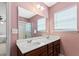 Bathroom boasts double sinks, great lighting, and a shower/tub at 1170 Deerberry Rd, Hanahan, SC 29410