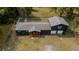 Aerial view of this newly renovated home displaying a sizable yard and new roof at 1211 Lem Rd, Cordesville, SC 29434