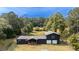 Expansive yard with mature trees surrounds this well-kept two story home at 1211 Lem Rd, Cordesville, SC 29434