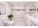 Bright bathroom featuring double shower heads, dual vanity, and modern fixtures at 1211 Lem Rd, Cordesville, SC 29434