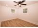 Empty bedroom with wood floors, white walls and ceiling fan at 1211 Lem Rd, Cordesville, SC 29434