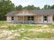 Exterior view of home under construction with visible framework and Grip Rite house wrap at 1219 Pineville Cir, Pineville, SC 29468