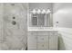 Stylish bathroom with marble tiles, modern fixtures, and a spacious shower with a built in bench at 1245 Lakefront Drive Dr, Charleston, SC 29412