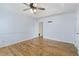 Bedroom showcases hardwood floors, an open doorway, ceiling fan, and neutral walls at 1245 Lakefront Drive Dr, Charleston, SC 29412