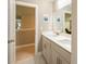 Bright bathroom offers a double vanity and a mirror at 125 Beam St, Huger, SC 29450