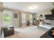 Spacious ' bedroom features a bunk bed, outdoor access, and natural light at 125 Beam St, Huger, SC 29450