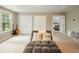Bonus room features a comfortable chaise lounge and natural light from the window at 125 Beam St, Huger, SC 29450