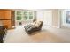 Bonus room features a sauna, comfortable seating, and natural light from the window at 125 Beam St, Huger, SC 29450