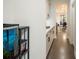 Hallway featuring modern cabinets and an aquarium; leads to dining area at 125 Beam St, Huger, SC 29450