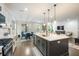 Open kitchen with an island, pendant lighting, and an eat-in kitchen at 125 Beam St, Huger, SC 29450