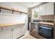 Efficient laundry room with modern appliances, ample storage, and bright natural light at 125 Beam St, Huger, SC 29450