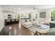 Bright open floor plan with kitchen island and inviting living area at 125 Beam St, Huger, SC 29450