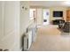 Relaxing living area with a recliner, television, and built-in shelving, creating a cozy atmosphere at 125 Beam St, Huger, SC 29450