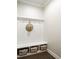 Functional mudroom with bench, storage and coat hooks at 125 Beam St, Huger, SC 29450