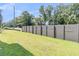 A fenced back yard with a well maintained lawn at 1304 Lieben Rd, Mount Pleasant, SC 29466
