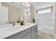 Well-lit bathroom features dual sinks, ample counter space, and stylish vanity at 1304 Lieben Rd, Mount Pleasant, SC 29466