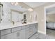 Spacious bathroom boasts dual sinks, a large mirror, and stylish fixtures at 1304 Lieben Rd, Mount Pleasant, SC 29466