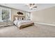 Bright bedroom with a ceiling fan and a decorative headboard at 1304 Lieben Rd, Mount Pleasant, SC 29466