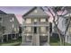 Charming two-story home with double balconies at twilight at 1304 Lieben Rd, Mount Pleasant, SC 29466