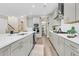 Well-lit kitchen with stainless steel appliances, gray cabinetry, and white countertops at 1304 Lieben Rd, Mount Pleasant, SC 29466