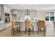 Kitchen featuring an island with seating, stainless steel appliances and gray cabinetry at 1304 Lieben Rd, Mount Pleasant, SC 29466