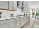 Modern kitchen features gray cabinetry, stainless steel appliances, and ample counter space at 1304 Lieben Rd, Mount Pleasant, SC 29466