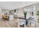 Open concept kitchen and dining area with modern furnishings and stainless steel appliances at 1304 Lieben Rd, Mount Pleasant, SC 29466