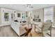 Open concept living area with modern fireplace, neutral tones, and bright windows at 1304 Lieben Rd, Mount Pleasant, SC 29466
