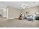 Spacious living room with plush carpet, comfortable seating, and neutral decor at 1304 Lieben Rd, Mount Pleasant, SC 29466