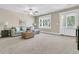 Inviting living room featuring a comfortable sofa, neutral tones, and a ceiling fan at 1304 Lieben Rd, Mount Pleasant, SC 29466