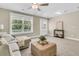 Cozy living room with a comfortable sofa, natural light, and backyard views at 1304 Lieben Rd, Mount Pleasant, SC 29466