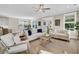 Spacious living room with neutral decor and a view into the kitchen and dining area at 1304 Lieben Rd, Mount Pleasant, SC 29466