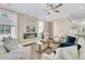 Cozy living room showcasing a linear fireplace, neutral tones, and abundant natural light at 1304 Lieben Rd, Mount Pleasant, SC 29466