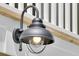 Close up of decorative outdoor light with seeded glass on the exterior at 1304 Lieben Rd, Mount Pleasant, SC 29466