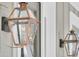 Close-up of elegant gas lanterns illuminating the home's exterior at 1304 Lieben Rd, Mount Pleasant, SC 29466