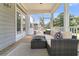 Inviting screened porch with comfortable seating and a view of the outdoors at 1304 Lieben Rd, Mount Pleasant, SC 29466