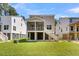Gray home with a screened porch, white stairs, and a spacious backyard at 1304 Lieben Rd, Mount Pleasant, SC 29466