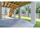 View under home with concrete pillars, concrete floor, and stairwell at 1304 Lieben Rd, Mount Pleasant, SC 29466