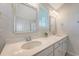Dual sink bathroom with a quartz countertop and a mirror at 143 Airy Dr, Summerville, SC 29486