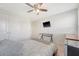 Inviting bedroom with ceiling fan, TV, desk and closet offering comfort and functionality at 143 Airy Dr, Summerville, SC 29486