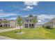 Charming two-story home with a well-maintained lawn, beautiful landscaping, and a welcoming facade at 143 Airy Dr, Summerville, SC 29486