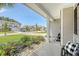 Inviting front porch with seating and views of the neighborhood, perfect for relaxing outdoors at 143 Airy Dr, Summerville, SC 29486