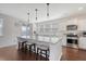 Bright eat-in kitchen with an island featuring bar seating and stainless steel appliances at 143 Airy Dr, Summerville, SC 29486