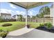Spacious backyard features a fire pit, lawn, shade trees, and a privacy fence at 145 Woodbrook Way, Moncks Corner, SC 29461