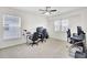 This bedroom has neutral walls, carpet, and big windows that let in lots of natural light at 145 Woodbrook Way, Moncks Corner, SC 29461
