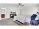 Comfortable bedroom featuring a bed, TV, and access to a bathroom creating a relaxing and private retreat at 145 Woodbrook Way, Moncks Corner, SC 29461