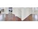 Upstairs landing with hardwood floors and white trim at 145 Woodbrook Way, Moncks Corner, SC 29461