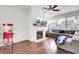 Cozy living room boasting a modern fireplace and large sectional with a TV above the mantel at 145 Woodbrook Way, Moncks Corner, SC 29461